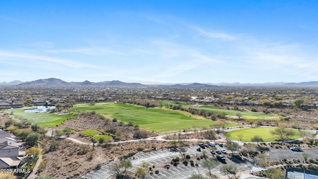 bird's eye view with golf course view and a mountain view