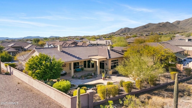 exterior space featuring a residential view and a mountain view