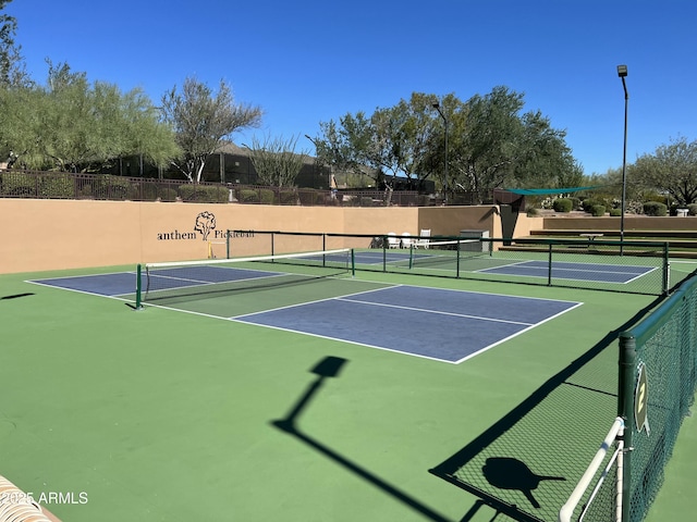 view of sport court with community basketball court and fence