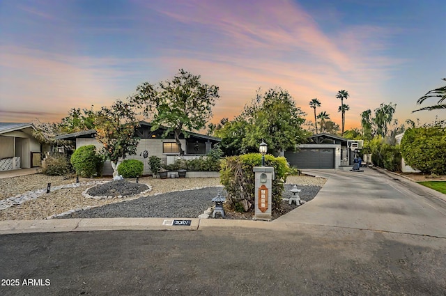 single story home with a garage