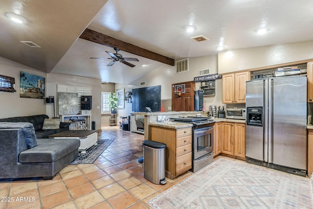 kitchen with ceiling fan, vaulted ceiling with beams, stainless steel appliances, light stone counters, and kitchen peninsula