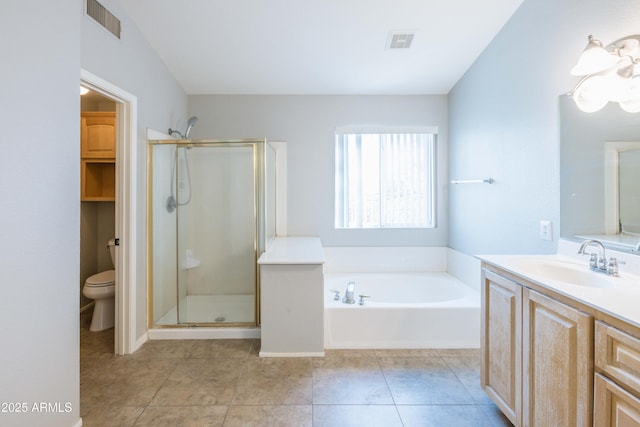 full bath with a stall shower, visible vents, toilet, vanity, and a bath