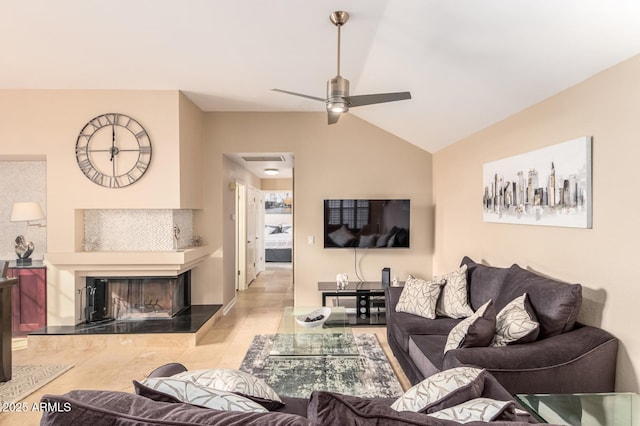 living area featuring vaulted ceiling, visible vents, a fireplace, and ceiling fan