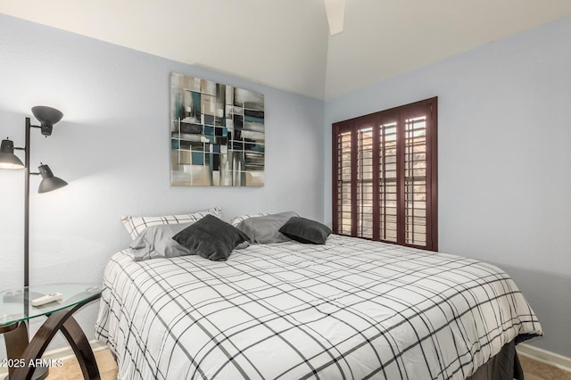 bedroom featuring baseboards