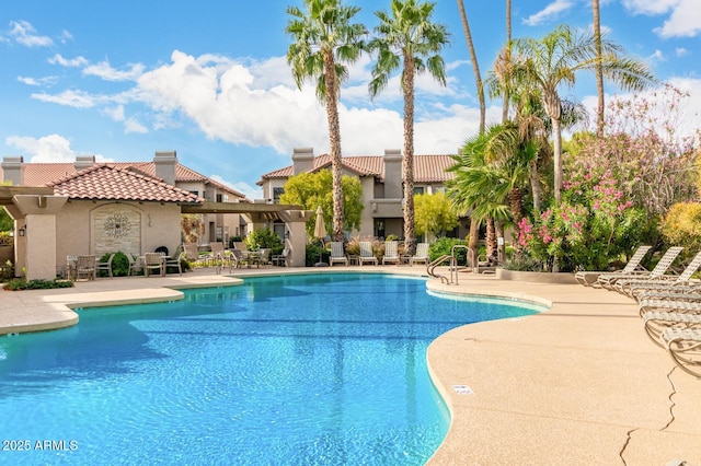 community pool featuring a patio