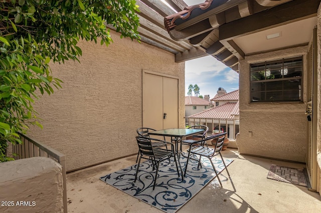 view of patio featuring outdoor dining space