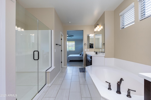 bathroom featuring tile patterned floors, plus walk in shower, and vanity