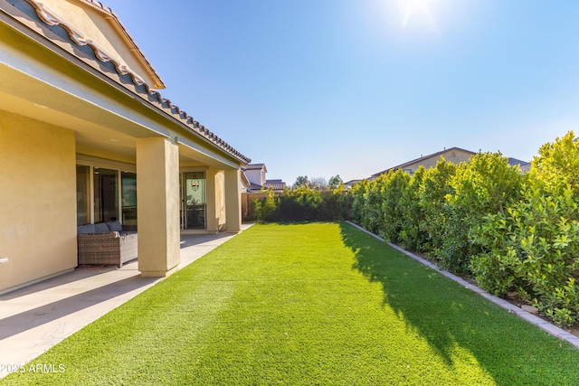 view of yard with a patio area