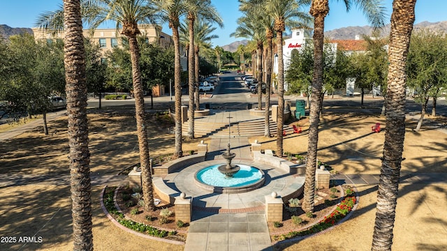 surrounding community featuring a mountain view