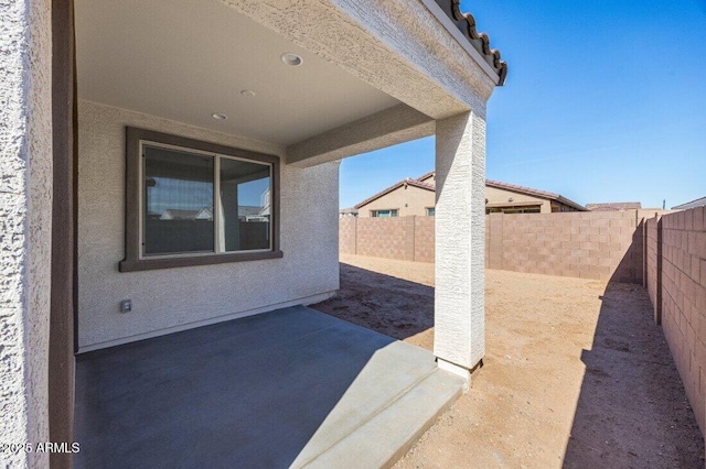 view of patio with a fenced backyard