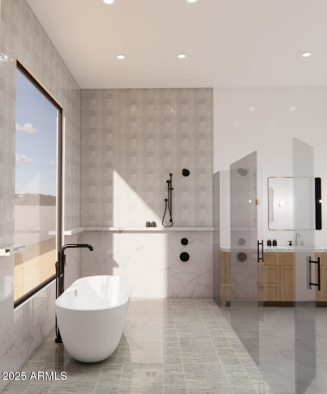 33962 N Cole Ranch Rd, Queen Creek, AZ 85144 - bathroom featuring a freestanding tub, tile walls, vanity, a walk in shower, and recessed lighting