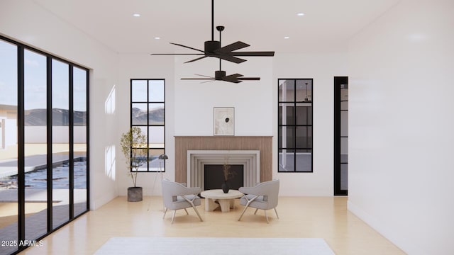 33962 N Cole Ranch Rd, Queen Creek, AZ 85144 - living room with recessed lighting, a ceiling fan, wood finished floors, and a fireplace