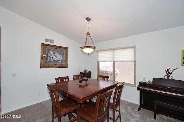 4506 E Lone Cactus Dr, Phoenix, AZ 85050 - carpeted dining area with baseboards and vaulted ceiling