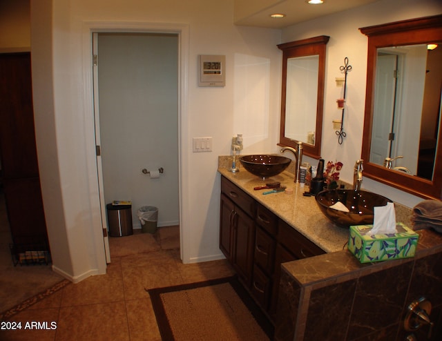 4506 E Lone Cactus Dr, Phoenix, AZ 85050 - full bathroom with a sink, baseboards, double vanity, and tile patterned floors