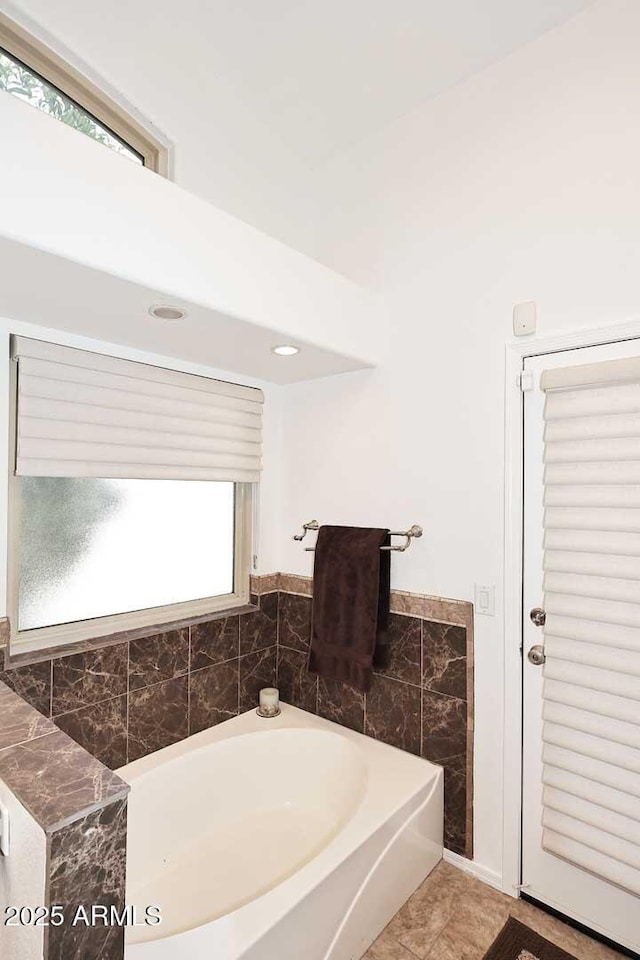 4506 E Lone Cactus Dr, Phoenix, AZ 85050 - full bath with a garden tub, tile walls, tile patterned flooring, and recessed lighting