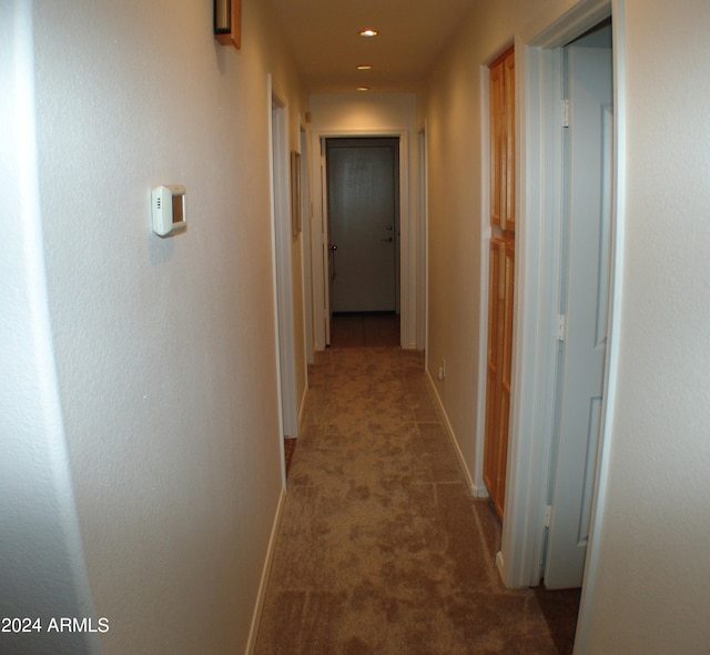 4506 E Lone Cactus Dr, Phoenix, AZ 85050 - hallway with baseboards and carpet