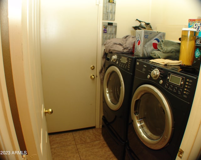 4506 E Lone Cactus Dr, Phoenix, AZ 85050 - laundry area with washing machine and dryer, laundry area, and tile patterned flooring