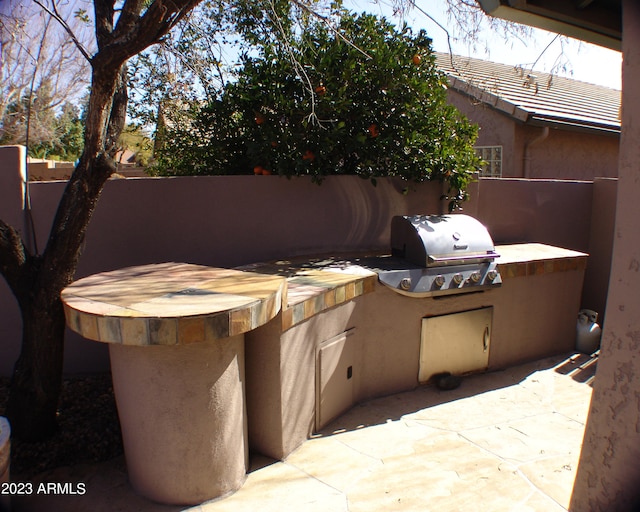 4506 E Lone Cactus Dr, Phoenix, AZ 85050 - view of patio featuring area for grilling and fence