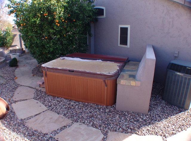 4506 E Lone Cactus Dr, Phoenix, AZ 85050 - exterior space with cooling unit and a hot tub
