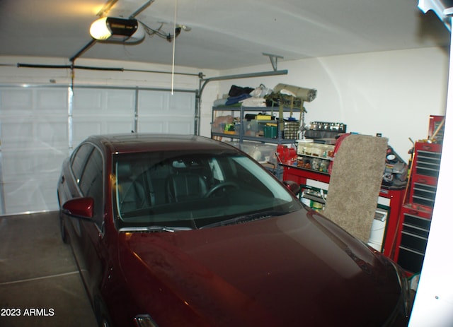 4506 E Lone Cactus Dr, Phoenix, AZ 85050 - garage featuring a garage door opener