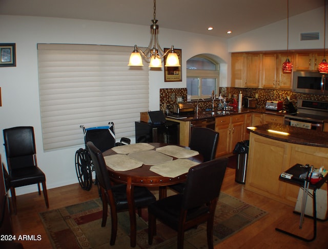 4506 E Lone Cactus Dr, Phoenix, AZ 85050 - dining room with recessed lighting, visible vents, dark wood-style floors, and vaulted ceiling