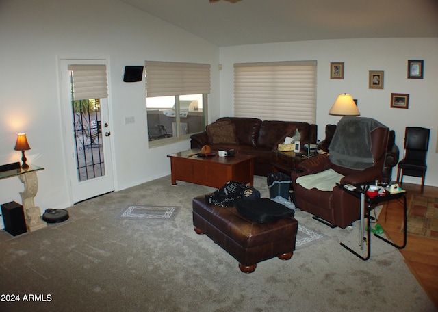 4506 E Lone Cactus Dr, Phoenix, AZ 85050 - carpeted living room featuring lofted ceiling