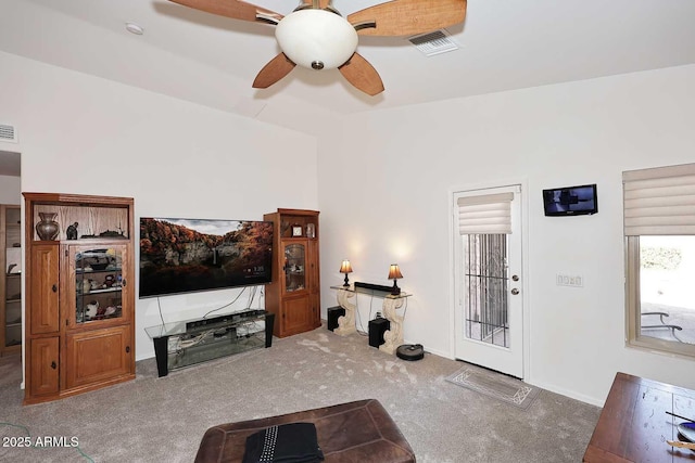 4506 E Lone Cactus Dr, Phoenix, AZ 85050 - living area with carpet floors, ceiling fan, and vaulted ceiling