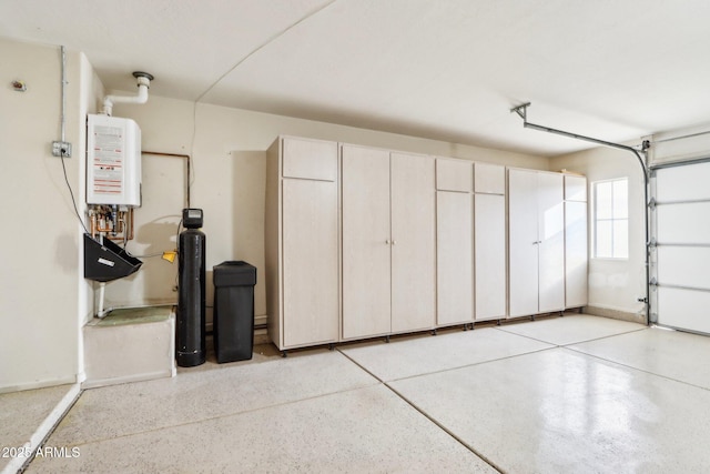 garage featuring water heater