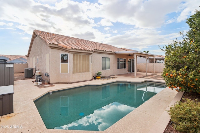 view of pool featuring central air condition unit and a patio