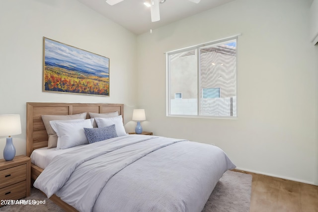 carpeted bedroom with ceiling fan