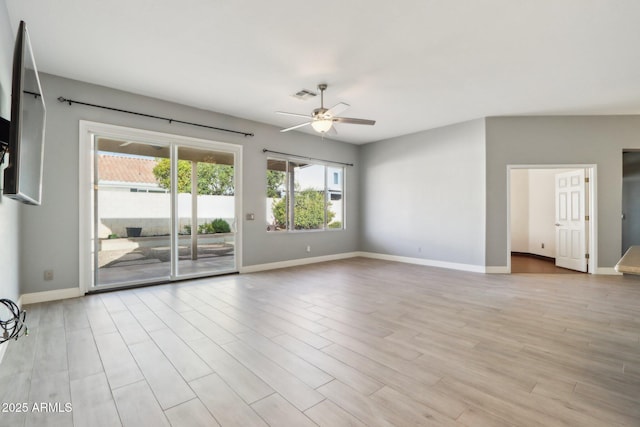 empty room featuring light hardwood / wood-style floors and ceiling fan