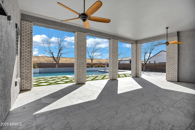 view of patio with a fenced backyard, a ceiling fan, and a fenced in pool