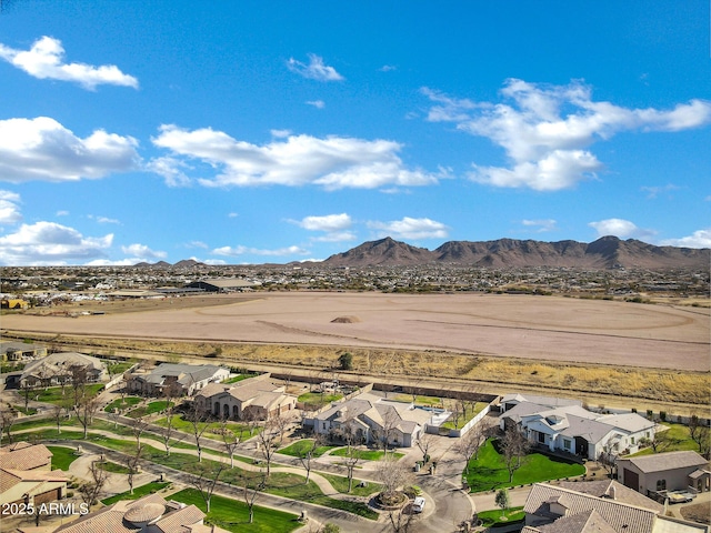 drone / aerial view with a residential view and a mountain view