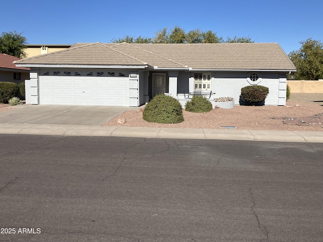 ranch-style home with a garage