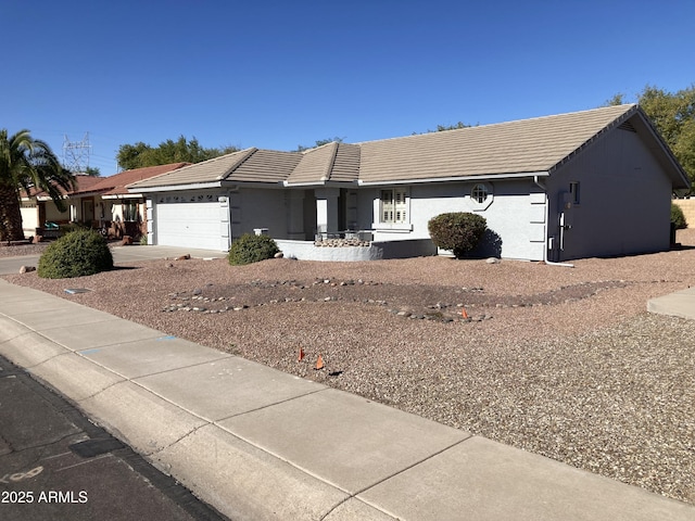 ranch-style house with a garage