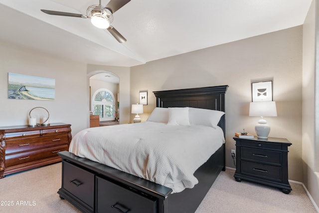 67 W Sarah Ln, Tempe, AZ 85284 - bedroom with light carpet, lofted ceiling, arched walkways, ceiling fan, and baseboards