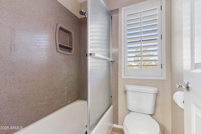 67 W Sarah Ln, Tempe, AZ 85284 - bathroom with toilet and enclosed tub / shower combo