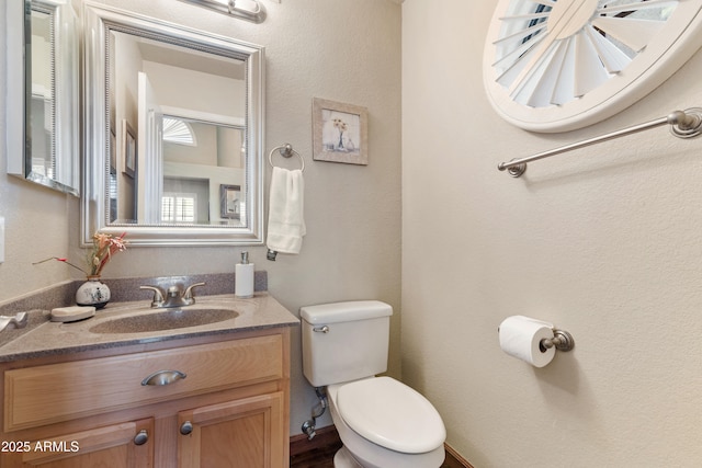 67 W Sarah Ln, Tempe, AZ 85284 - bathroom featuring toilet and vanity