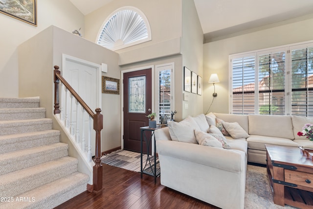 67 W Sarah Ln, Tempe, AZ 85284 - foyer with dark wood-type flooring, plenty of natural light, stairway, baseboards, and lofted ceiling