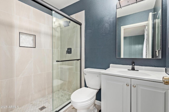 4624 S Fair Ln, Tempe, AZ 85282 - full bath featuring a textured wall, toilet, a shower stall, and vanity