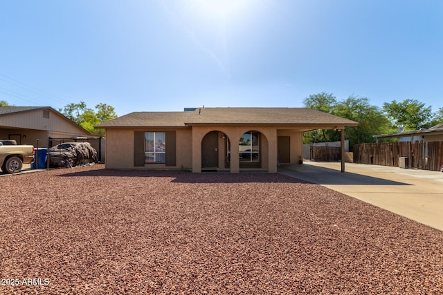 4624 S Fair Ln, Tempe, AZ 85282 - ranch-style home featuring concrete driveway, a carport, and stucco siding