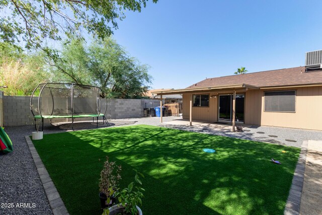 4624 S Fair Ln, Tempe, AZ 85282 - view of yard with a trampoline, a patio area, and central air condition unit
