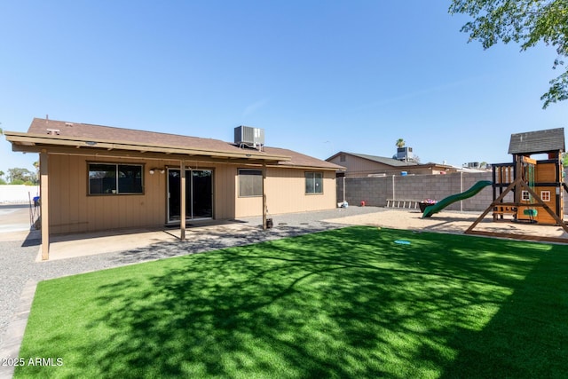 4624 S Fair Ln, Tempe, AZ 85282 - rear view of house with central AC, a playground, and a patio