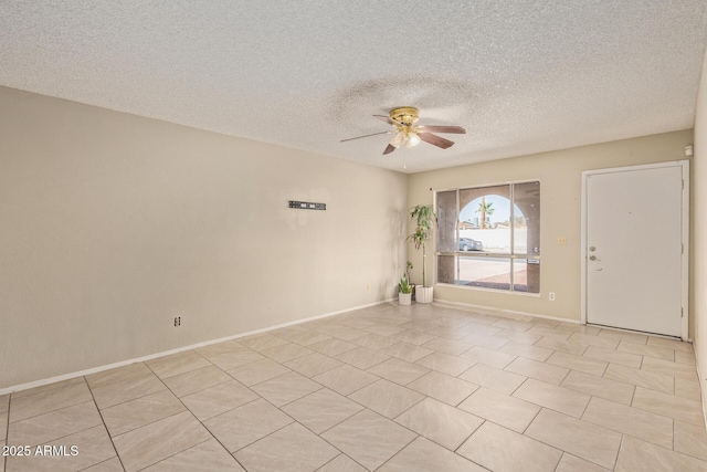 4624 S Fair Ln, Tempe, AZ 85282 - empty room with ceiling fan, a textured ceiling, baseboards, and light tile patterned flooring