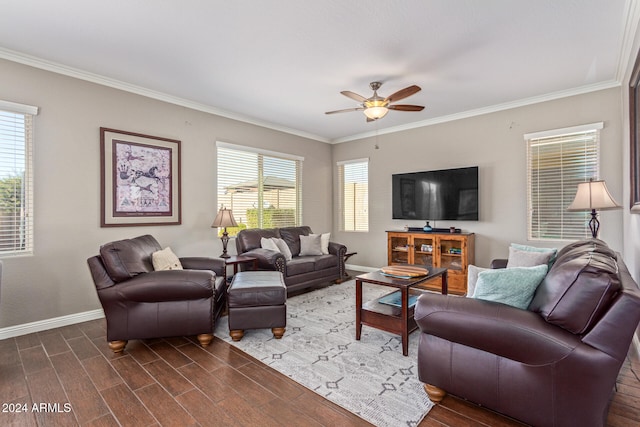 living room with ceiling fan, plenty of natural light, dark hardwood / wood-style flooring, and crown molding