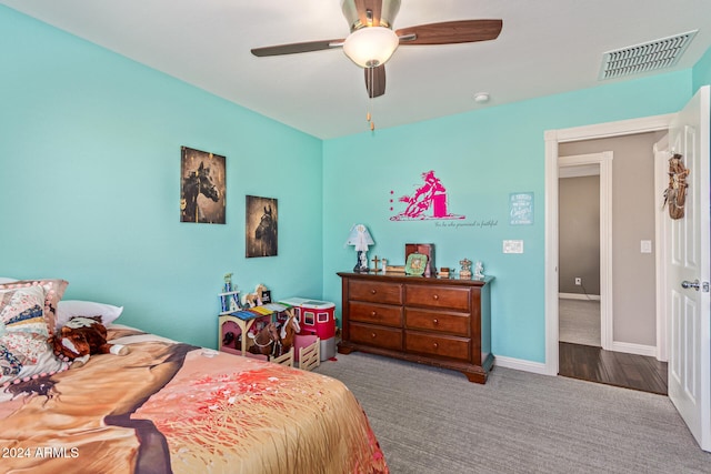 carpeted bedroom with ceiling fan