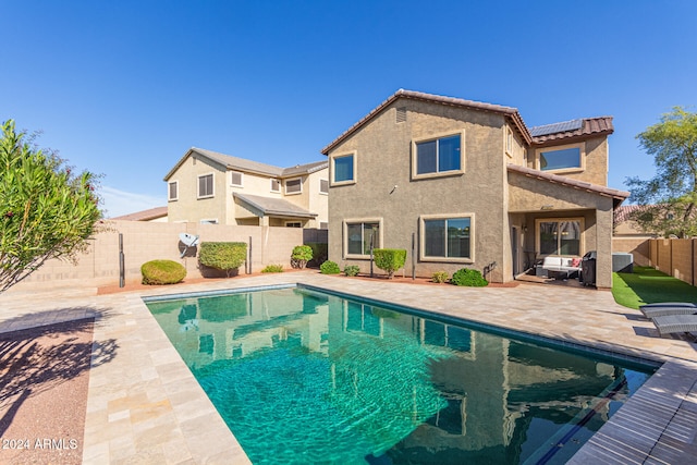 view of pool featuring a patio area