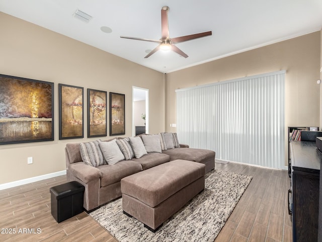 living room with ceiling fan