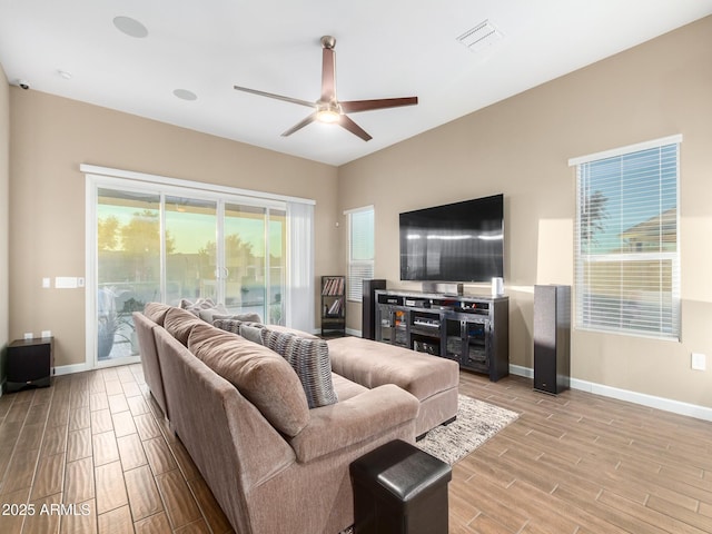 living room featuring ceiling fan