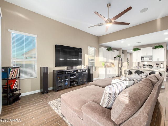 living room with ceiling fan